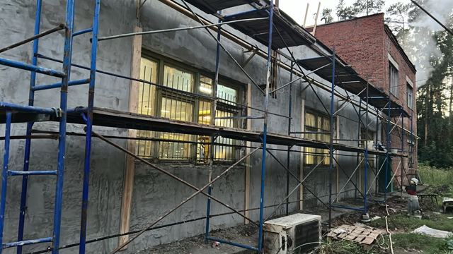 Штукатурка фасада с лесов